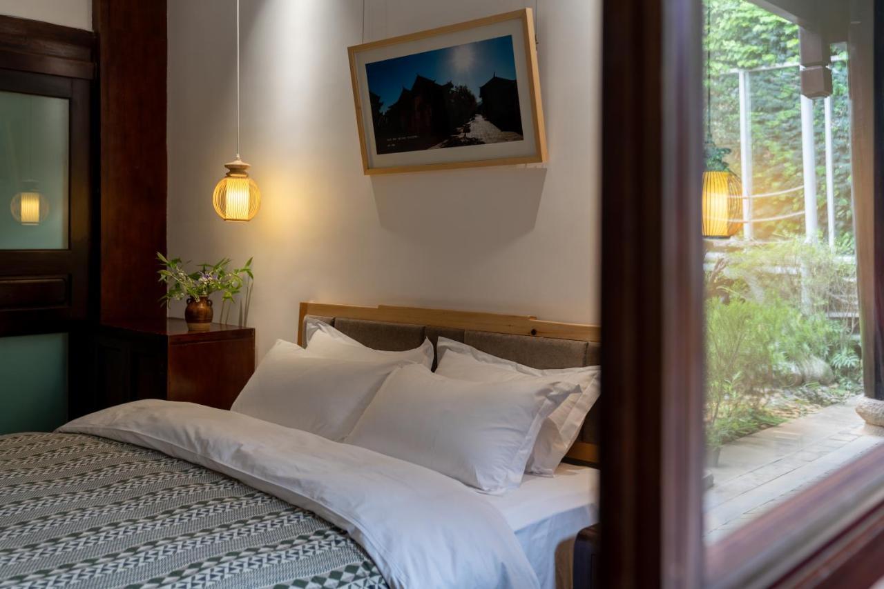 Jun Bo Xuan Boutique Hotel Лицзян Экстерьер фото