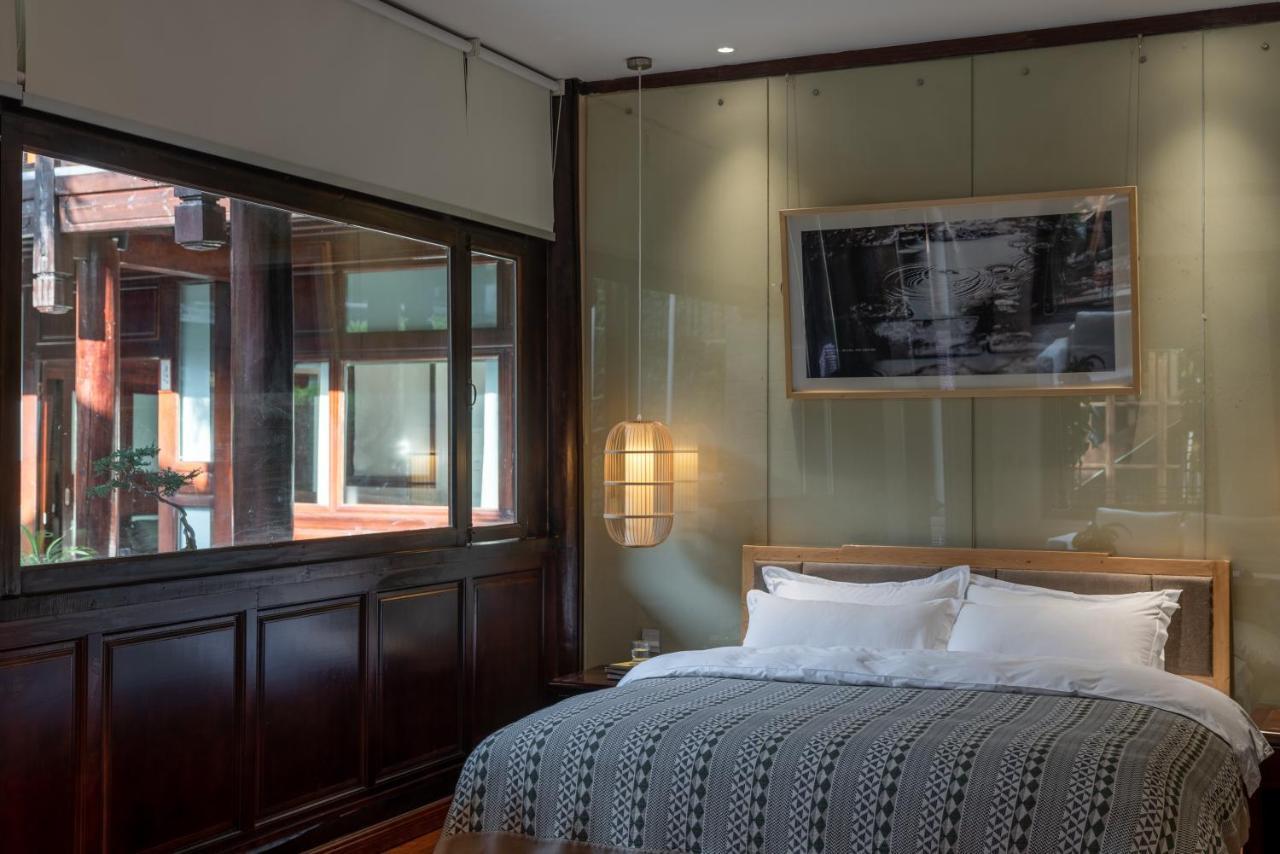 Jun Bo Xuan Boutique Hotel Лицзян Экстерьер фото