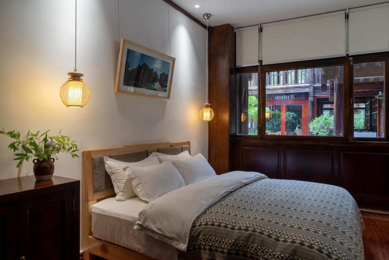 Jun Bo Xuan Boutique Hotel Лицзян Экстерьер фото