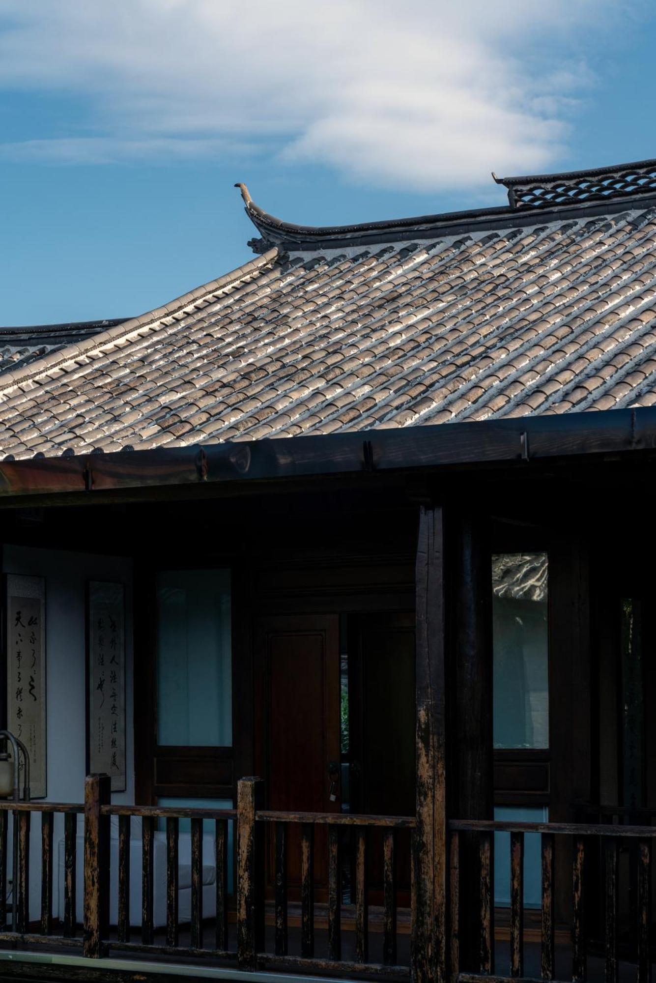 Jun Bo Xuan Boutique Hotel Лицзян Экстерьер фото