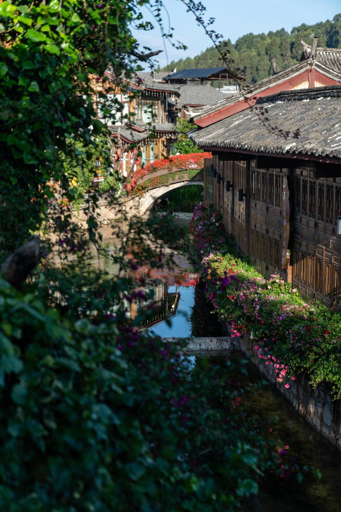 Jun Bo Xuan Boutique Hotel Лицзян Экстерьер фото